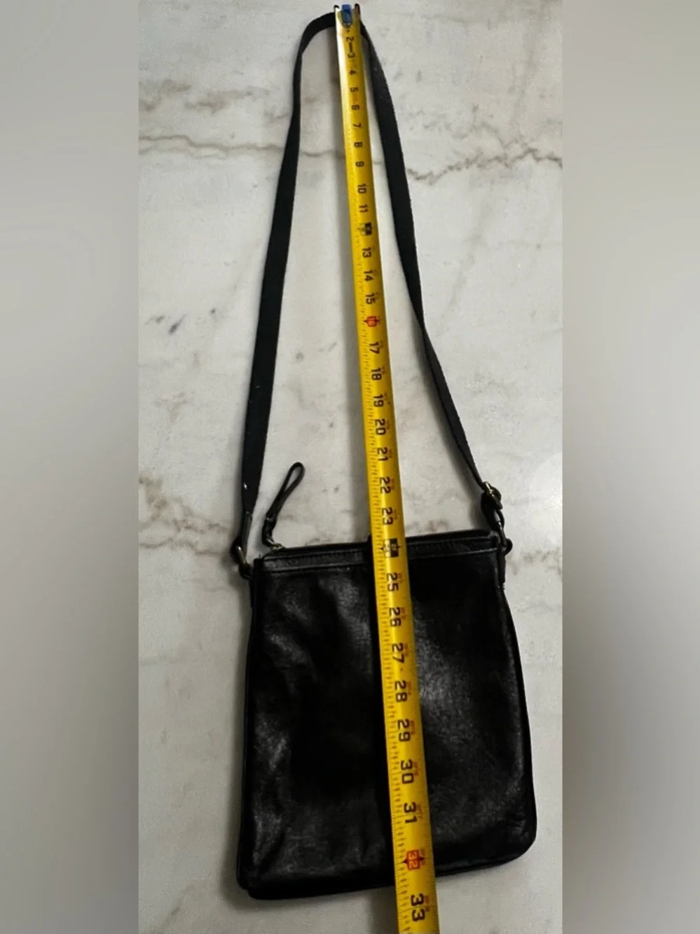 The Sak Black Leather Crossbody Bag with Gold Hardware And Colorful Lining